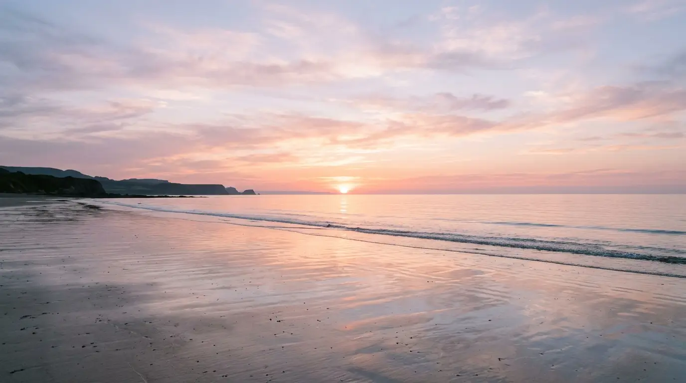 sunset over calm beach 202605250038